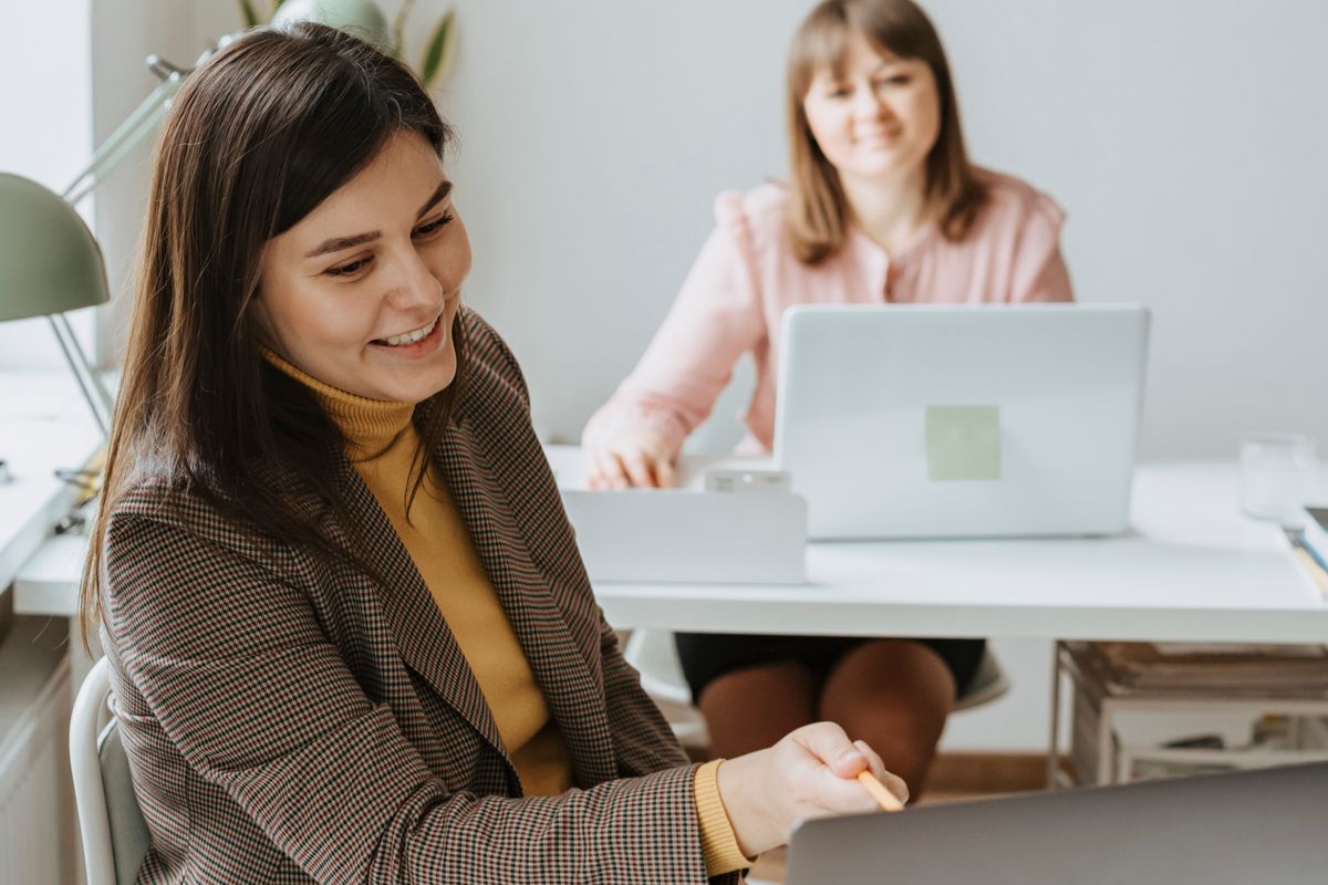 Two colleagues working through a schedule